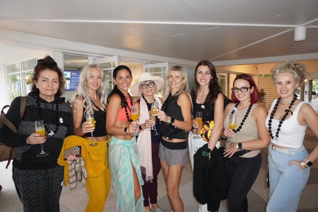 Group Arrival to Resort Group of women being welcomed in at Club Med Resort in Turks and Caicos