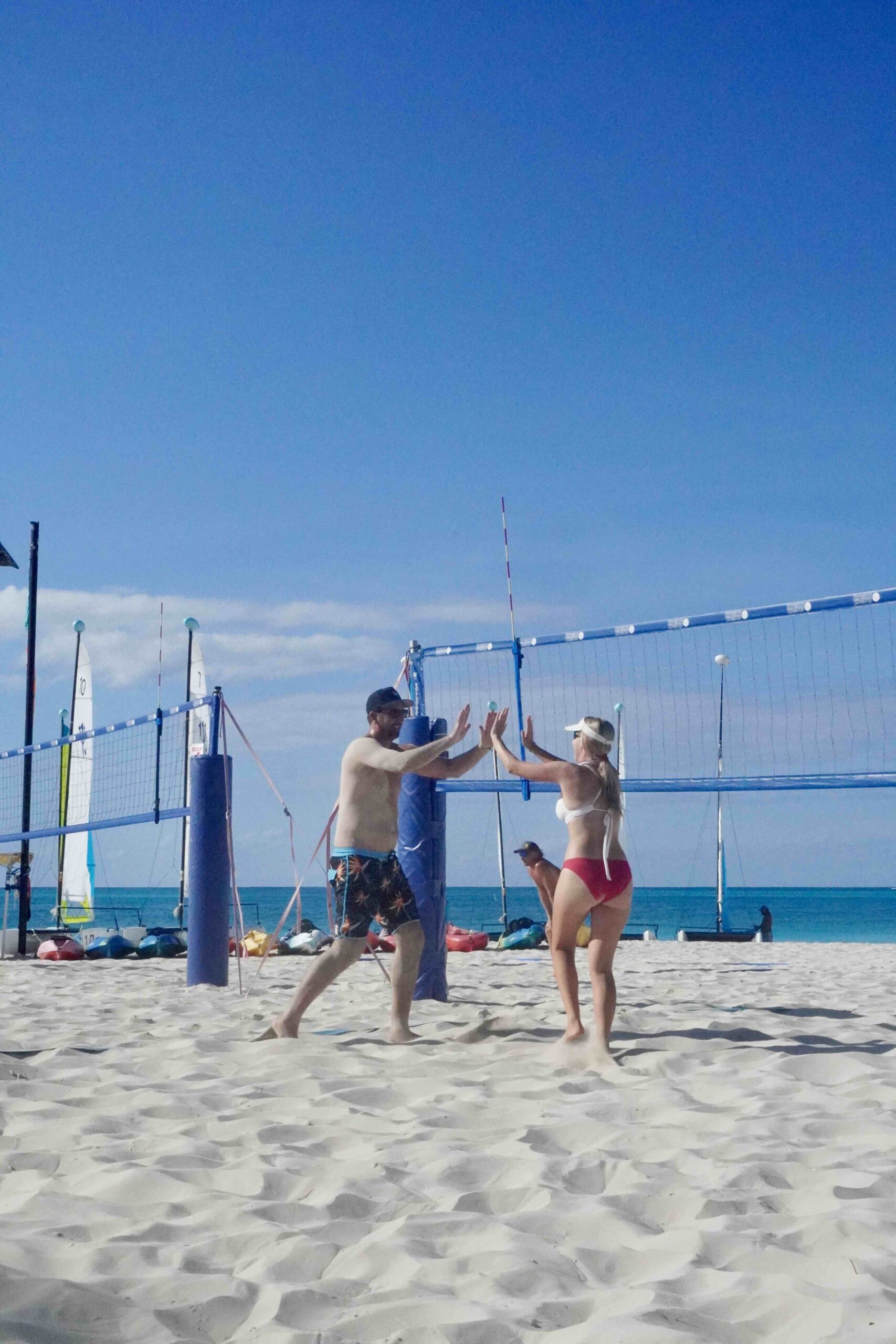 Sean Rosenthal High Five Sean "Rosie" Rosenthal gives high five to beach Volleyball Vacations camper